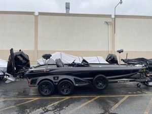 Ranger Z521R Cup-Equipped 2024 Ranger Z521R Cup-Equipped boat, black, parked outdoors, side view.