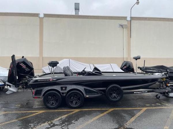 Ranger Z521R Cup-Equipped 2024 Ranger Z521R Cup-Equipped boat, black, parked outdoors, side view.