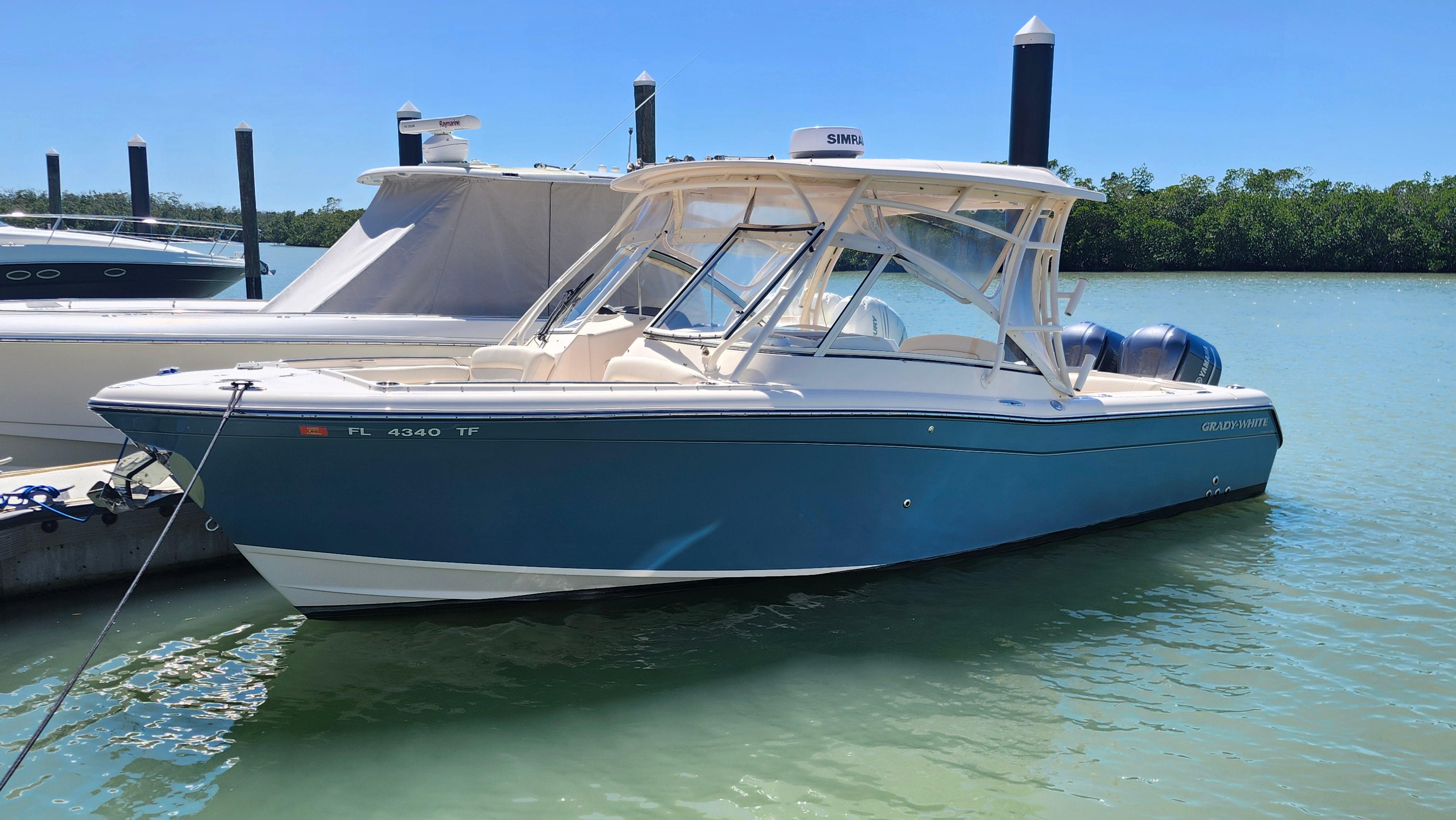 Grady-White Freedom 285 2020 Grady-White Freedom 285 boat docked in sunny marina.