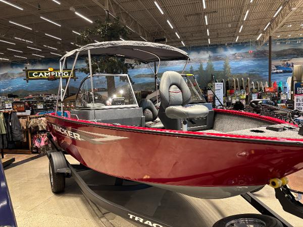 Tracker Pro Guide V-175 WT 2025 Tracker Pro Guide V-175 WT boat displayed in a showroom.