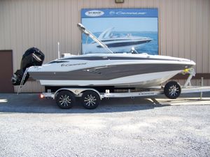 Crownline Eclipse E210 XS 2026 Crownline Eclipse E210 XS boat on trailer, displayed outdoors.