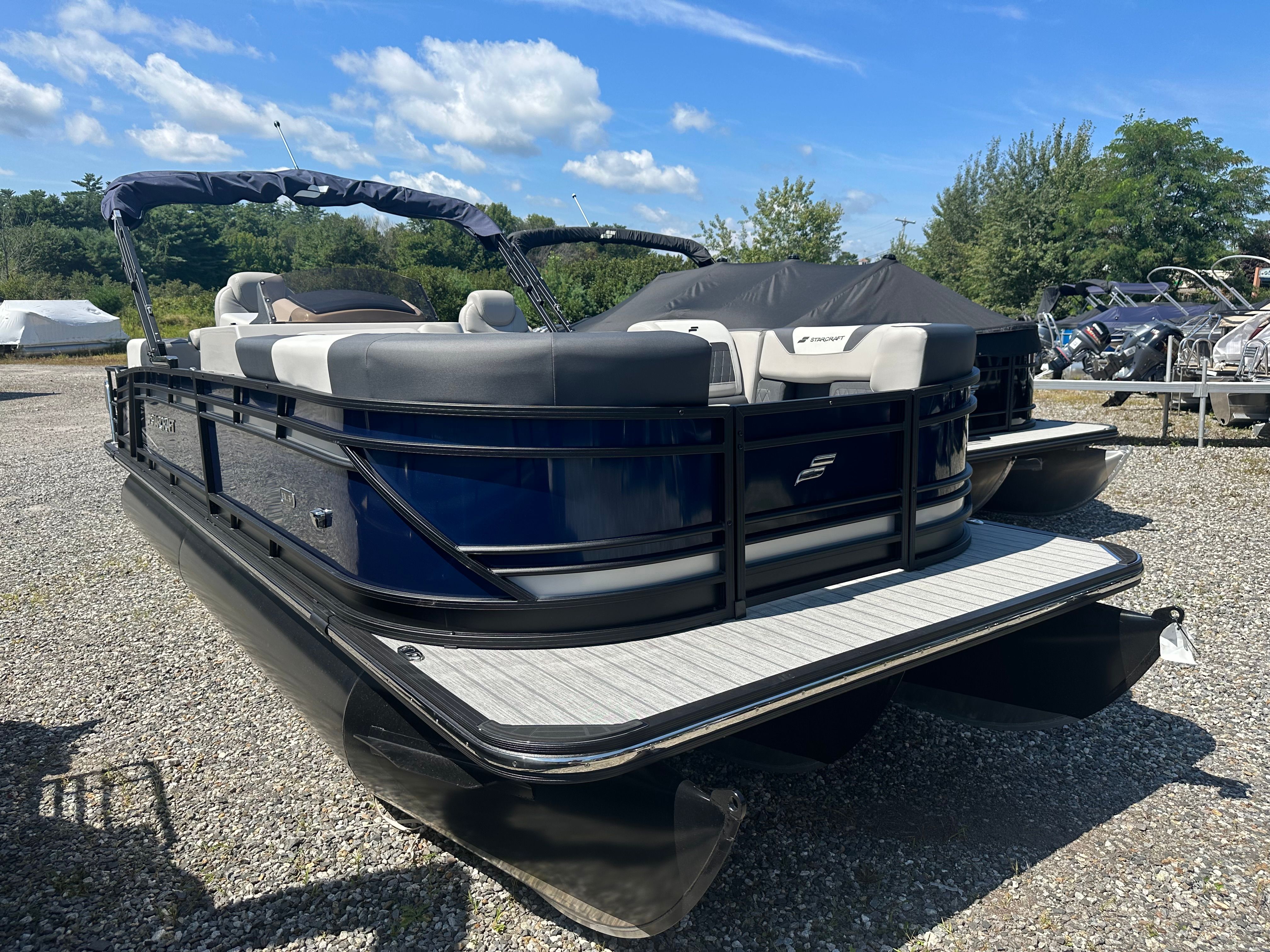 Starcraft SLS 3 2025 Starcraft SLS 3 pontoon boat with sleek design, parked outdoors on gravel.