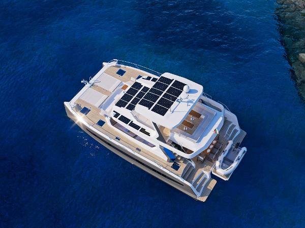 Custom Omaya 50 Power Catamaran Aerial view of 2025 Custom Omaya 50 Power Catamaran with solar panels on blue water.