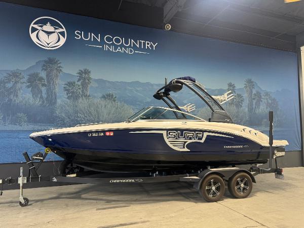 Chaparral 23 Surf 2020 Chaparral 23 Surf boat on trailer at Sun Country Inland showroom.