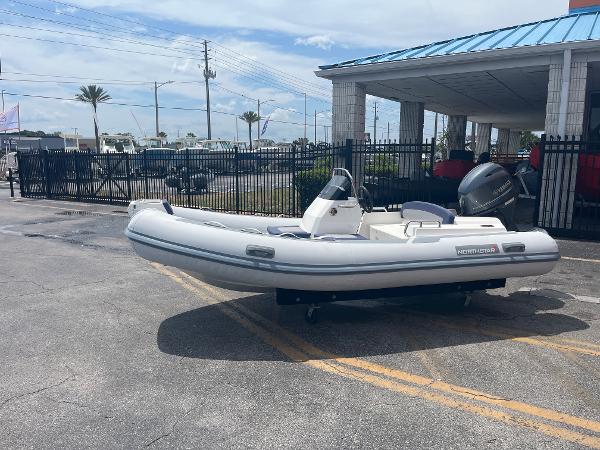 Northstar Axis 4.2 2022 Northstar Axis 4.2 inflatable boat displayed outdoors near a building.