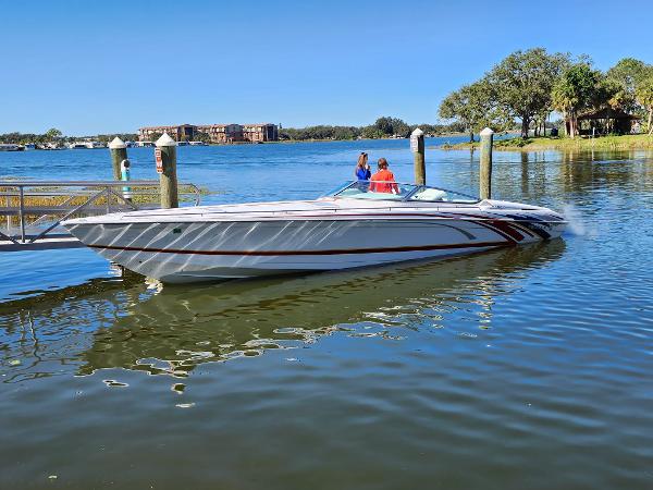 Formula 353 FASTech 2007 Formula 353 FASTech speedboat docked on a sunny day.