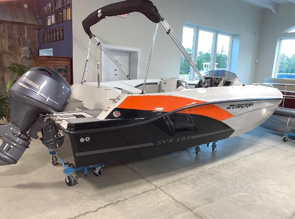 Starcraft SVX 191 2024 Starcraft SVX 191 boat with Yamaha outboard motor in showroom.