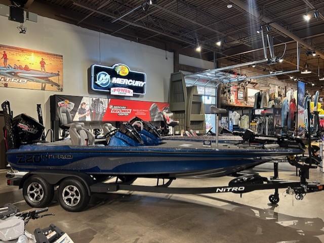 Nitro Z20 XL Pro 2025 Nitro Z20 XL Pro boat displayed in a showroom with Mercury signage.