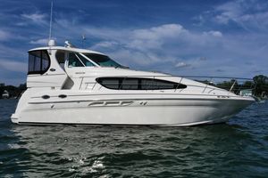 Sea Ray 390 Motor Yacht 2004 Sea Ray 390 Motor Yacht on water under blue sky.