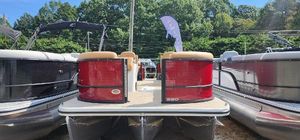 Crest CLASSIC 220 SLC 2025 Crest CLASSIC 220 SLC pontoon boat displayed outdoors.