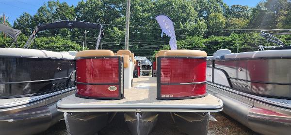 Crest CLASSIC 220 SLC 2025 Crest CLASSIC 220 SLC pontoon boat displayed outdoors.