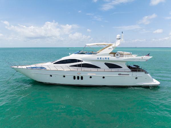 Azimut 80 Carat 2004 Azimut 80 Carat yacht Azure cruising on turquoise waters.