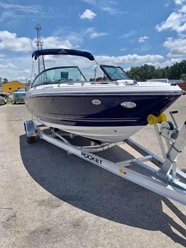 Monterey 197 Outboard 2017 Monterey 197 Outboard boat on trailer under blue sky.