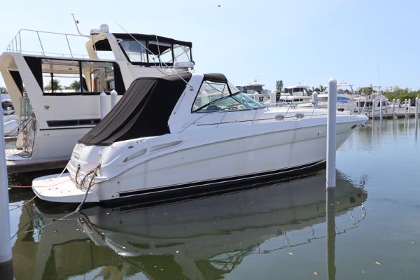 Sea Ray 380 Sundancer 1999 Sea Ray 380 Sundancer yacht docked in a marina.