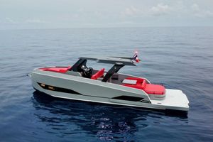 Kumbra 36 Modern 2026 Kumbra 36 yacht with sleek design and red seating on calm ocean waters.