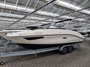 Sea Ray Sun Sport 230 Outboard 2022 Sea Ray Sun Sport 230 OB boat on trailer in indoor showroom.