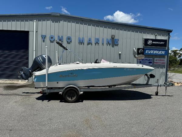 NauticStar 193SC 2022 NauticStar 193SC boat on trailer at Toho Marine dealership.