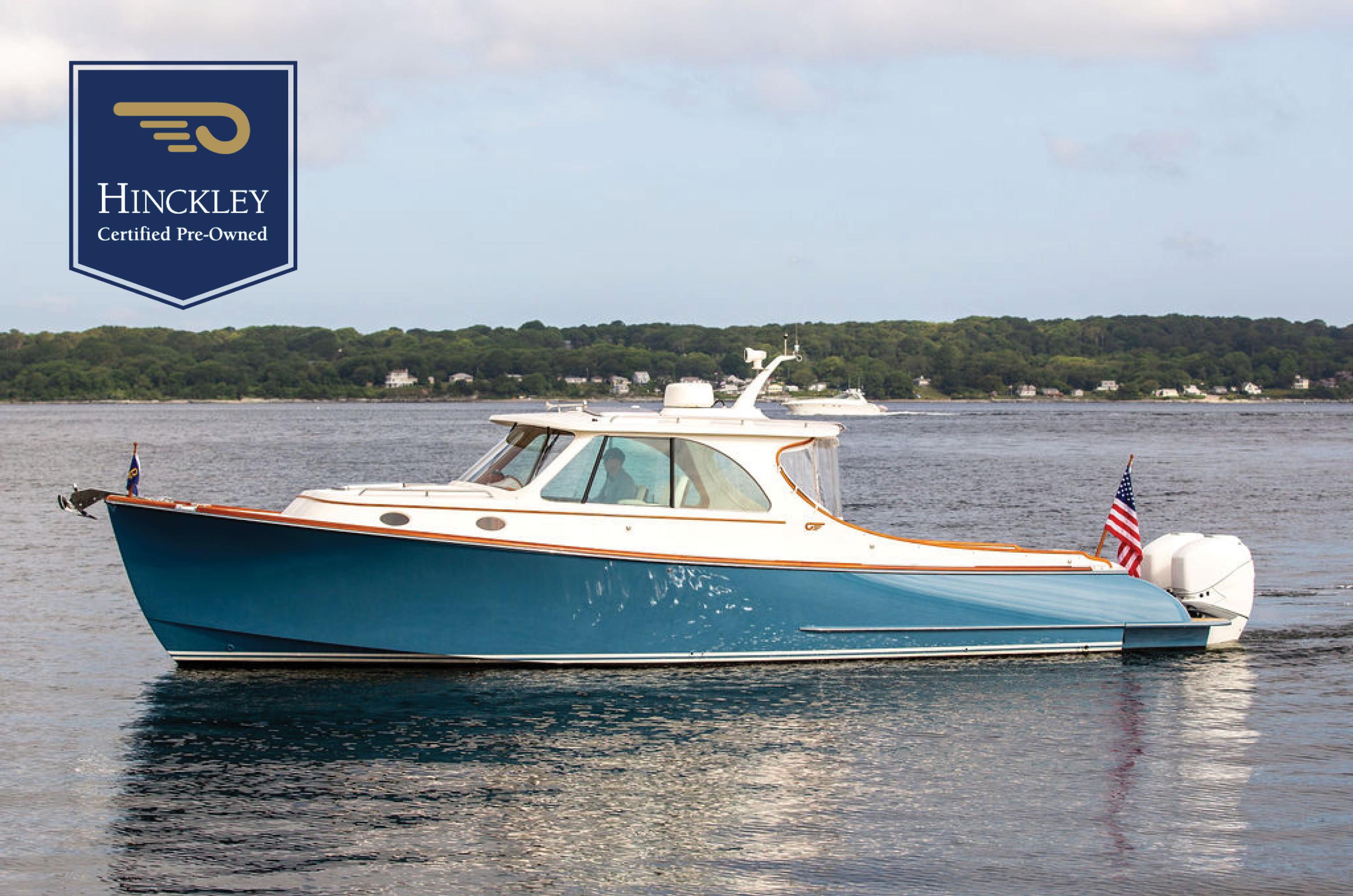 Hinckley 35 Hinckley 35 yacht, 2022 model, certified pre-owned, cruising on calm waters.