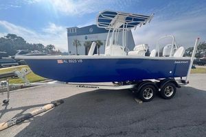 Savannah SS21 2024 Savannah SS21 boat on trailer, blue hull, parked outdoors.