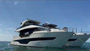 Cranchi Sessantasette 67 2023 Cranchi Sessantasette 67 yacht on calm blue sea under clear sky.