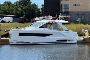 Jeanneau DB/37 OB 2026 Jeanneau DB/37 OB yacht docked at marina, modern design, sunny day.