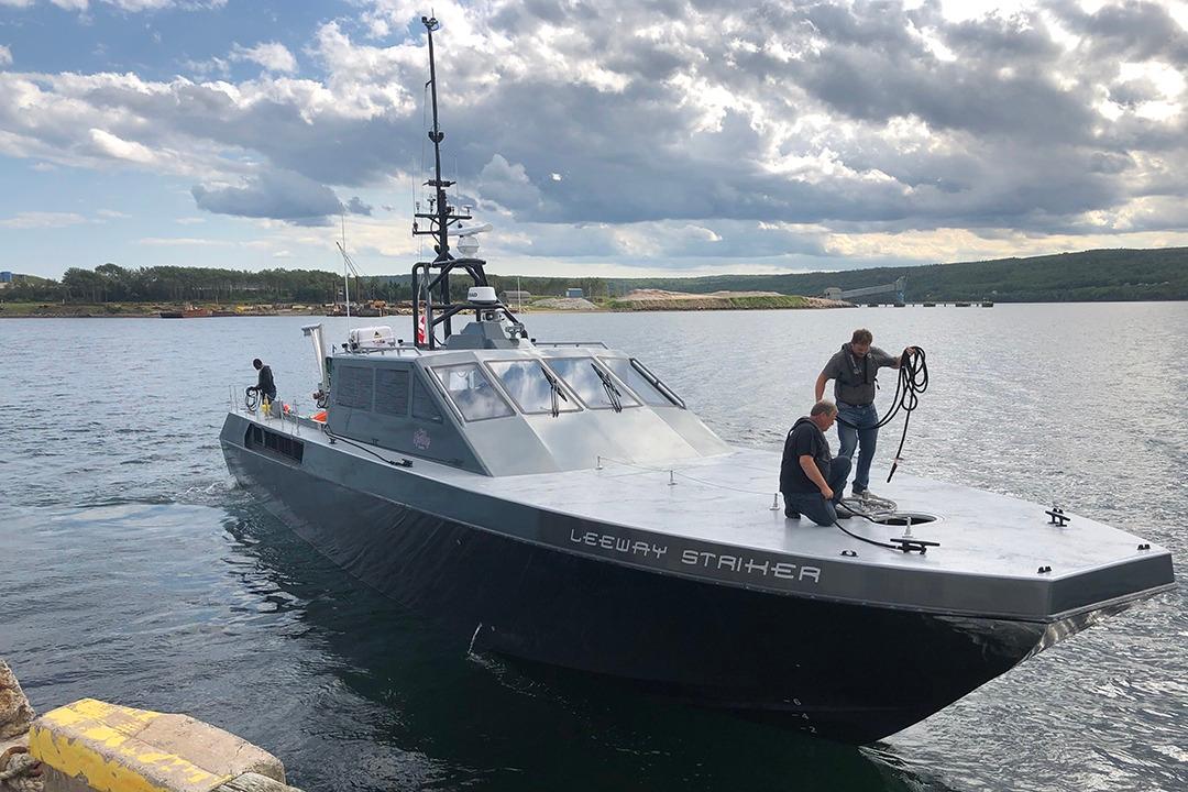 River Hawk 73 Sea Stryker Fast Patrol Boat River Hawk 73 Sea Stryker Fast Patrol Boat, 2012, docked with crew on deck.