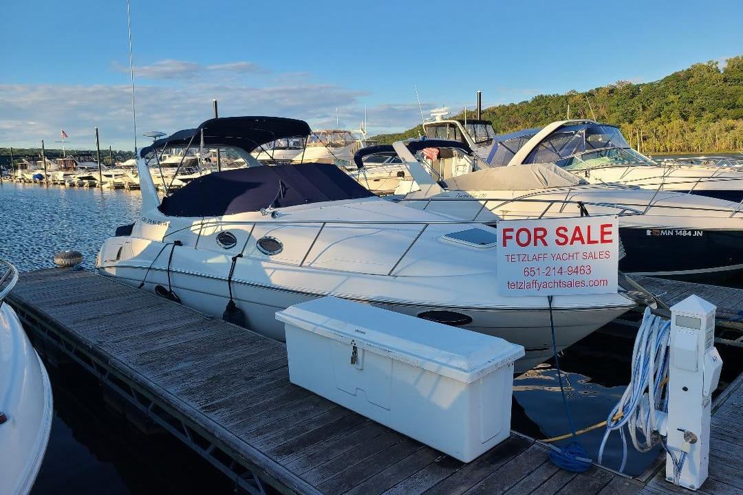 Regal Commodore 3060 2003 Regal Commodore 3060 yacht for sale at marina dock, sunny day.
