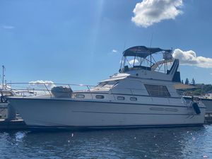 Viking Princess 385 1986 Viking Princess 385 yacht docked under a clear blue sky.