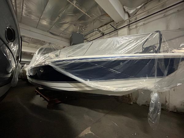 Formula 330 Ss 2007 Formula 330 SS boat covered in plastic, stored indoors.