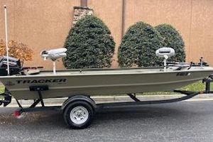 Tracker Grizzly 1754 AWL 2025 Tracker Grizzly 1754 AWL boat on trailer, parked outdoors.