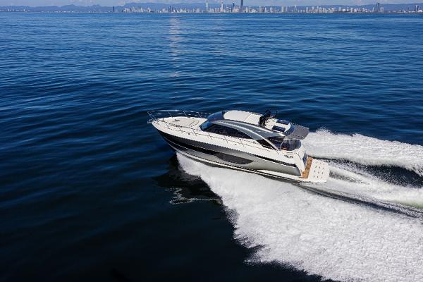 Riviera 4600 Sport Yacht Platinum Edition 2025 Riviera 4600 Sport Yacht Platinum Edition cruising on open water.