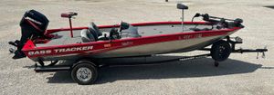Bass Tracker PRO TEAM 190 TX 2008 Bass Tracker PRO TEAM 190 TX fishing boat with Mercury engine on trailer.