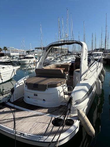 Bavaria Sport 32 2013 Bavaria Sport 32 yacht docked in marina, featuring sleek design and spacious deck.