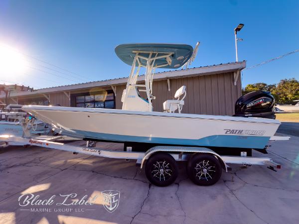 Pathfinder TRS 2200 2024 Pathfinder TRS 2200 boat on trailer, displayed outdoors at Black Label Marine Group.