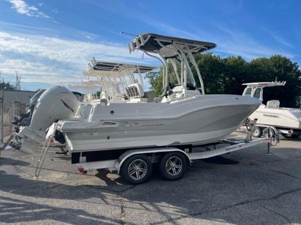 Finseeker 210 FS 2024 Finseeker 210 FS boat on a trailer under a clear blue sky.