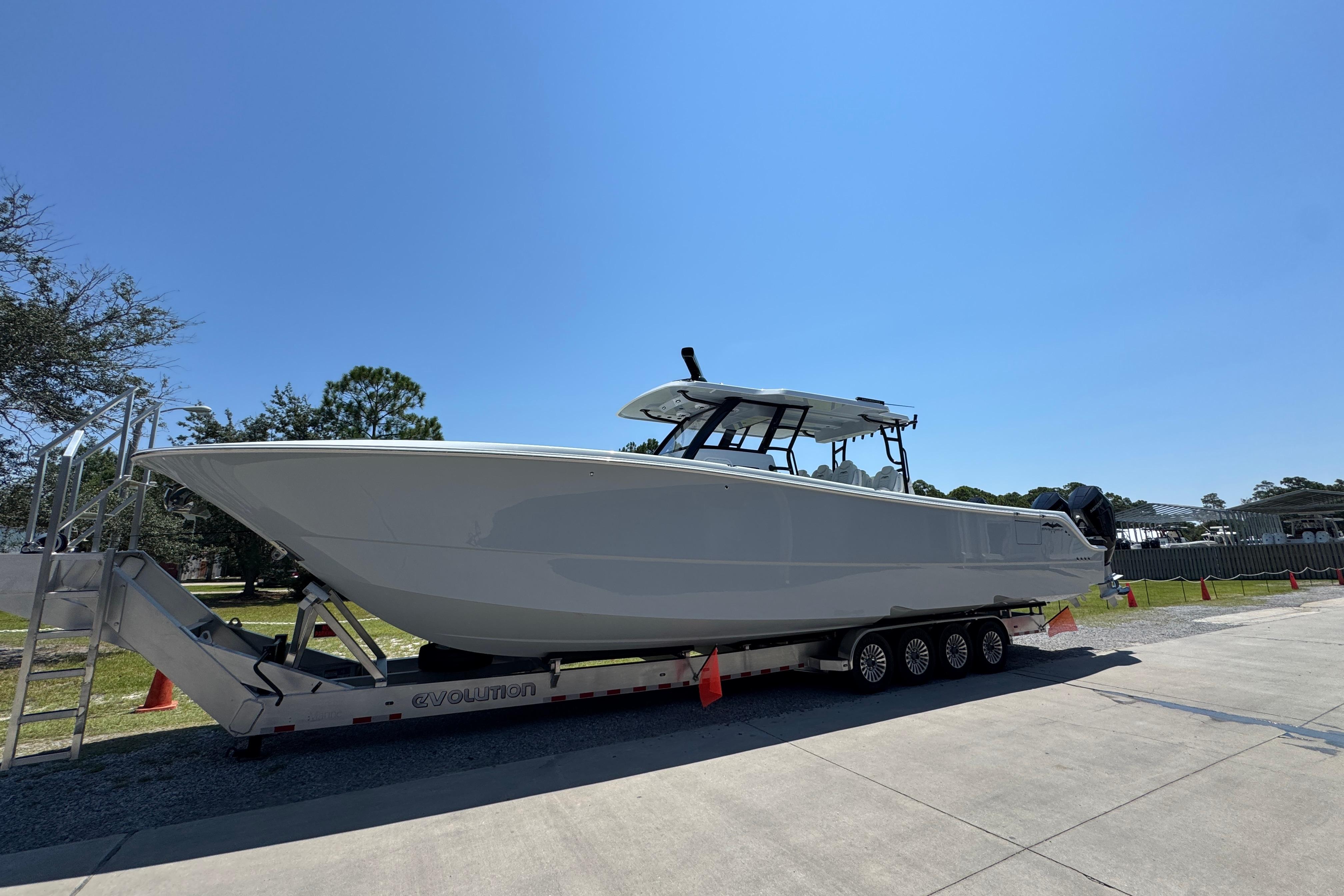 Invincible 46 Catamaran 2026 Invincible 46 Catamaran on trailer under clear blue sky.