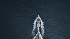 XO Boats EXPLR 10S PLUS Aerial view of 2023 XO Boats EXPLR 10S PLUS cruising on open water.