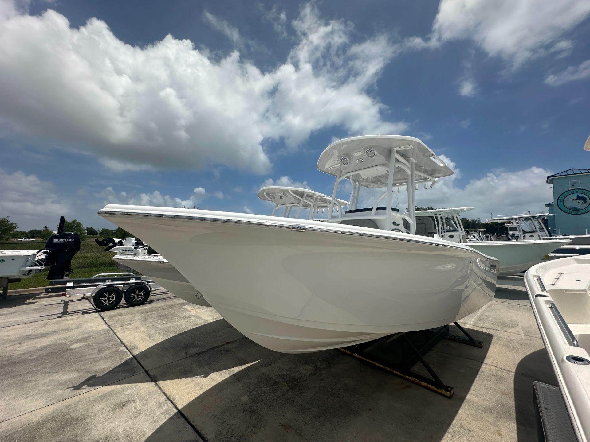 Sea Pro 222 Center Console 2024 Sea Pro 222 Center Console boat on display under a cloudy sky.