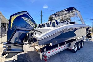 Midnight Express 37 Open 2022 Midnight Express 37 Open boat with powerful 450 engine on trailer.