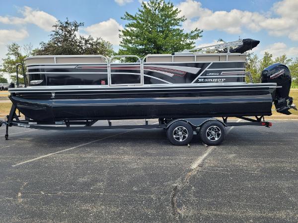 Ranger Reata 223C 2023 Ranger Reata 223C pontoon boat on a trailer, black exterior, parked outdoors.