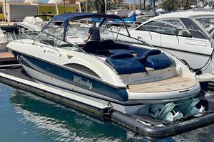 Windy 35 Khamsin 2007 Windy 35 Khamsin motorboat docked at marina, featuring sleek design and spacious seating.