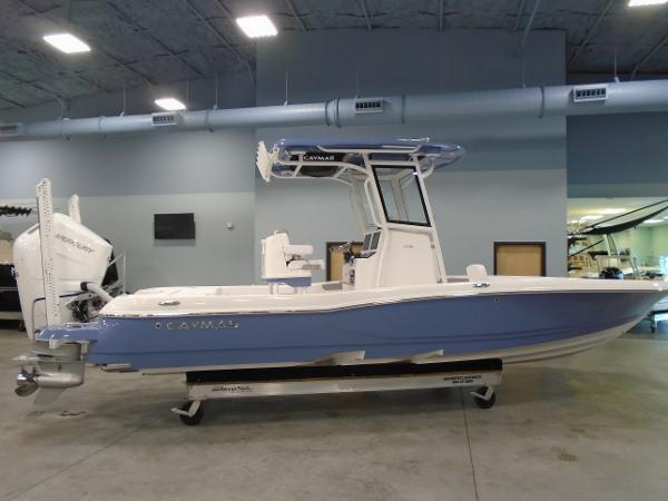 Caymas 26 HB 2025 Caymas 26 HB boat in showroom, featuring sleek design and modern features.