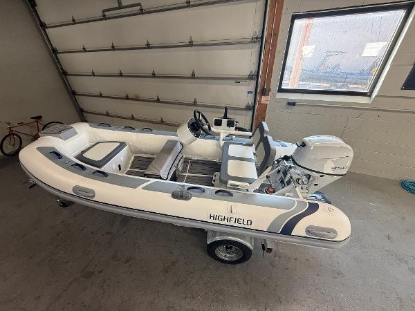 Highfield Classic 380 FCT 2025 Highfield Classic 380 FCT inflatable boat in a garage setting.