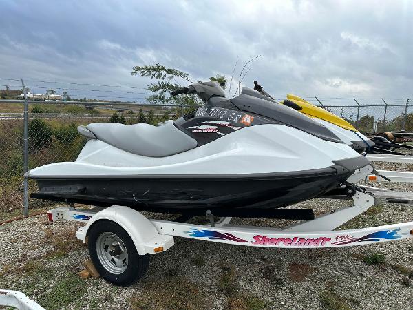 Yamaha WaveRunner VX 2014 Yamaha WaveRunner VX on trailer, parked outdoors, cloudy sky background.