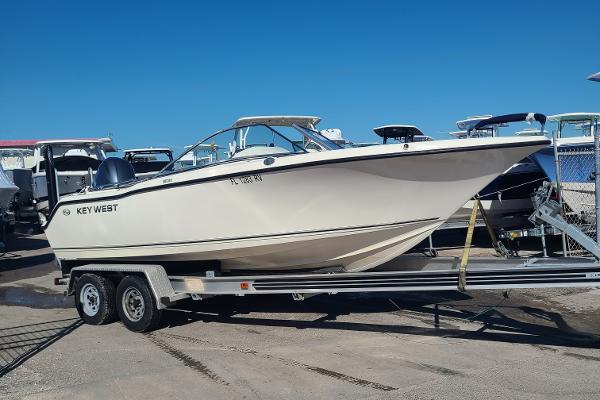 Key West 203 DFS 2018 Key West 203 DFS boat on trailer under clear blue sky.