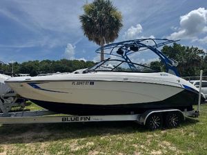 Yamaha Boats 242X E-Series 2018 Yamaha Boats 242X E-Series on trailer, parked outdoors under a clear sky.
