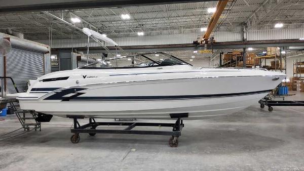 Formula 240 Bowrider 2025 Formula 240 Bowrider boat in a warehouse setting.