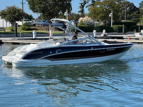 Formula 270 Bowrider 2013 Formula 270 Bowrider boat cruising on a calm marina.