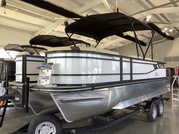 G3 SELECT 324SS 2025 G3 SELECT 324SS pontoon boat in showroom, featuring sleek design and dual canopy.