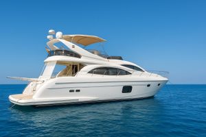 Astondoa 59 GLX 2007 Astondoa 59 GLX yacht on calm blue sea under clear sky.